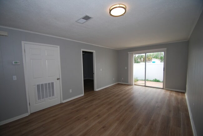 Building Photo - Beach Living at it's Best!  Two Bedroom/On...