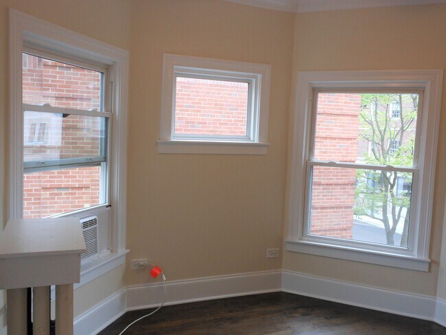 Bedroom 2 with bay windows - 805-09 W. Elm St.