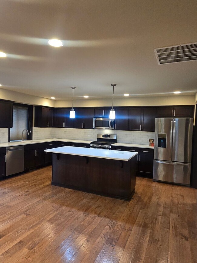 Building Photo - Welcome to this beautiful 4-bedroom, 2.5-b...