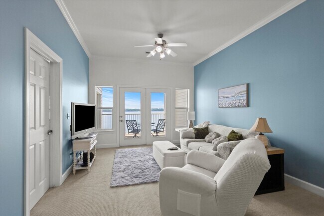 Building Photo - Riverfront Living with Spacious Layout and...
