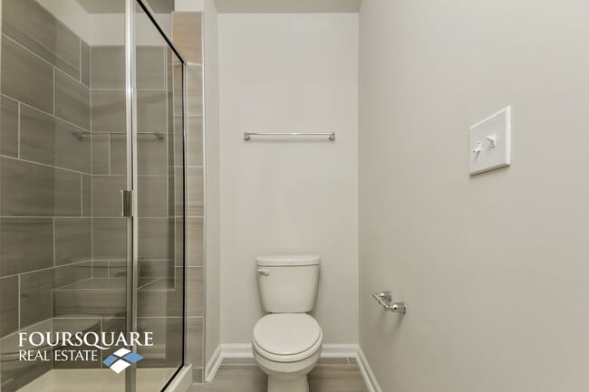 Building Photo - Modern 3-Story Townhome with First-Level B...