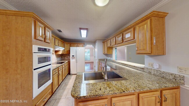 Building Photo - 2217 Hammock Oaks Dr N