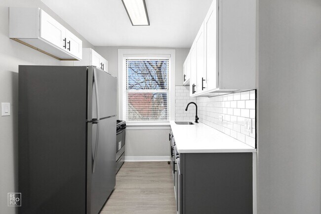 Building Photo - 7706 South Coles