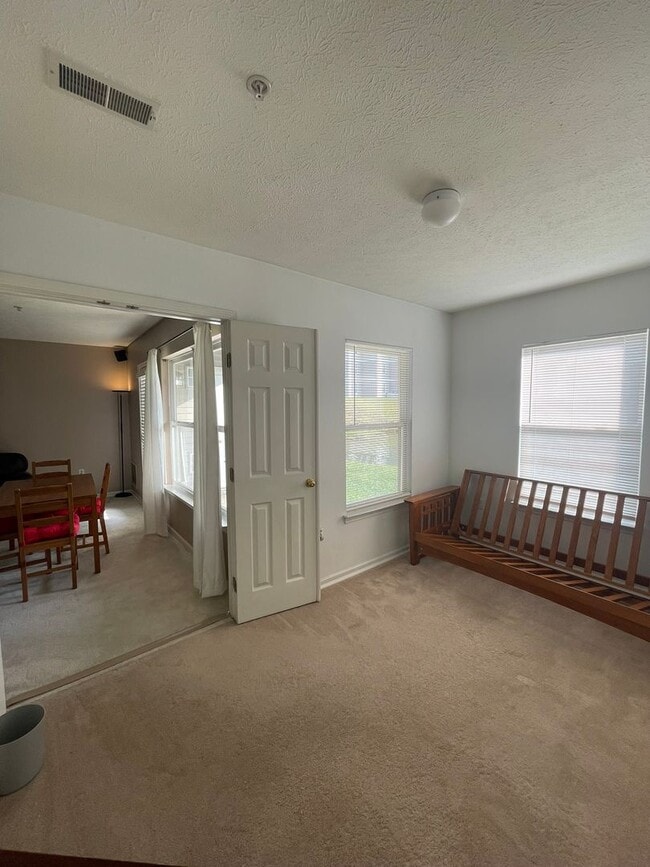 Building Photo - Move-In Ready Condo – Furniture is Optional