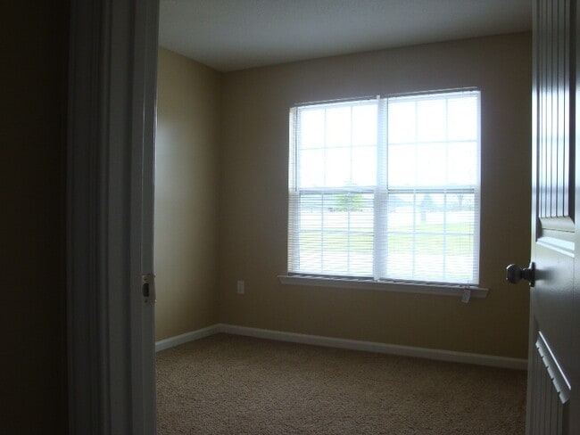 Building Photo - Charming 3BR/2BA Home with Fenced Yard, Ga...
