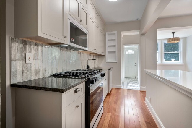 Building Photo - Available Now! Recently Renovated 4 Bedroo...