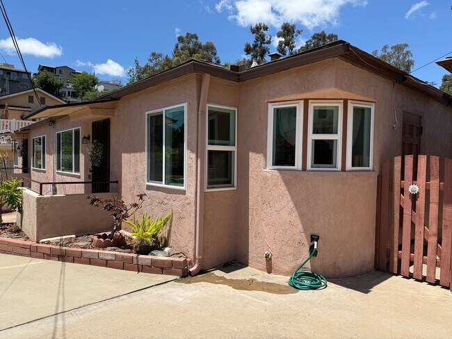 Building Photo - MOVE IN NOW! Cozy Two Bedroom! Shared Outdoor Space!