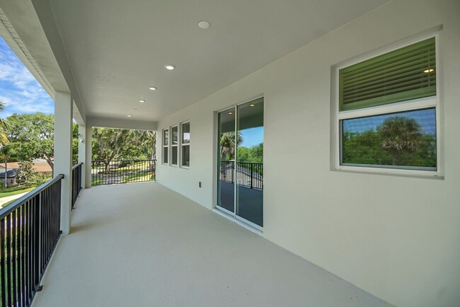 Building Photo - Stunning 4/3 in Gated Dora Parc! Water Views!