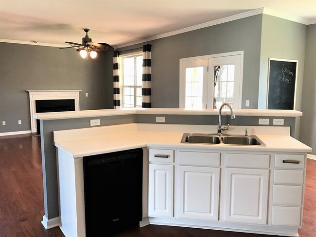 Building Photo - Great Family Home -  Fenced Backyard - Garage!