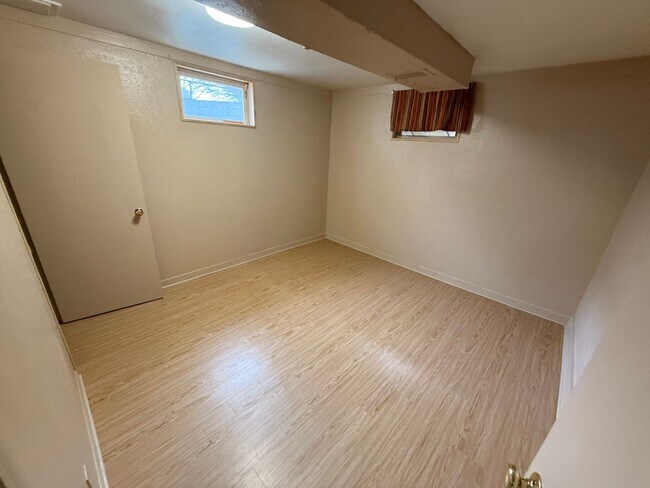 Building Photo - 4 Bedroom 2 Bathroom Home on Large Corner Lot with 2 Car Attached Garage In Great Neighborhood In...