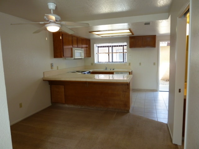 Building Photo - Great Two Story Condo in a Nice Area & Near Gym!