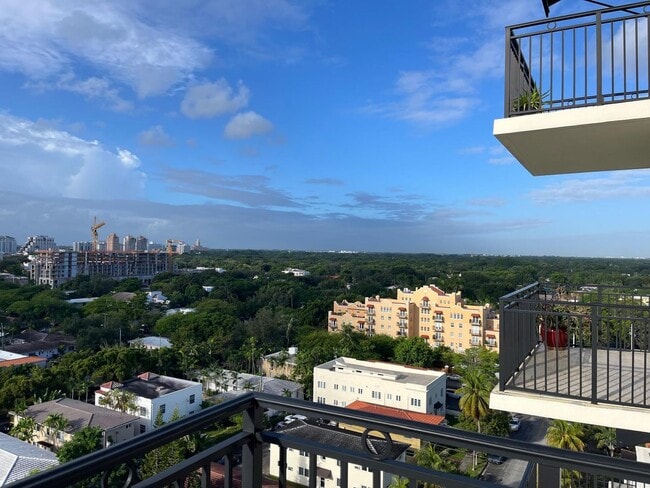 Building Photo - Modern 1BR/1BA Condo with 2 Parking Spaces – Prime Coral Gables Location