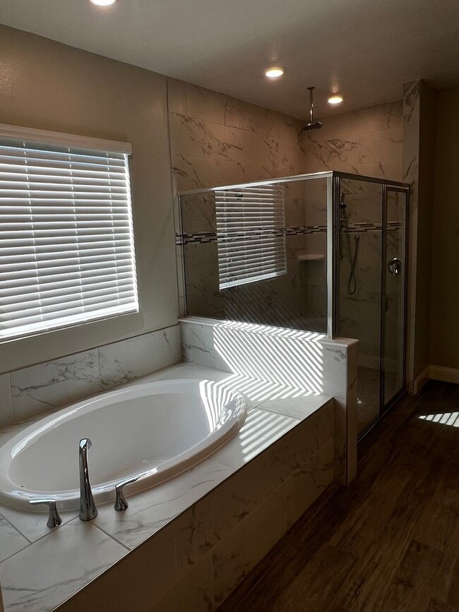 Building Photo - FOUR BEDROOMS and THREE BATHS For Rent