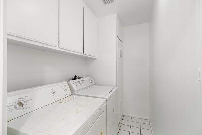 Laundry: full size side by side washer & dryer, abundant storage - 1745 S Bentley Ave
