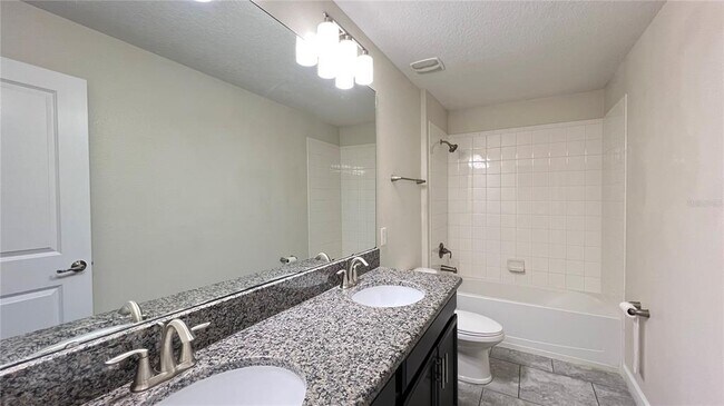 Building Photo - 7755 Purple Finch St