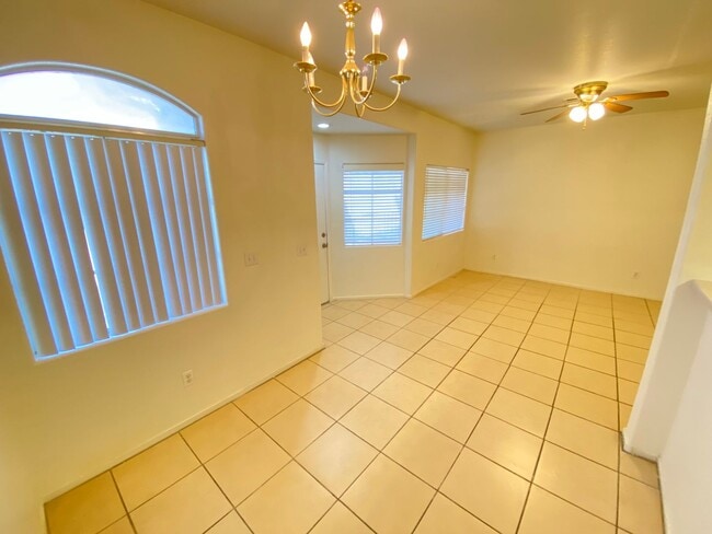 Building Photo - Charming 2 Bed/3Bath/2 Car Garage, Townhome nestled in this beautiful Summerlin North Gated Commu...