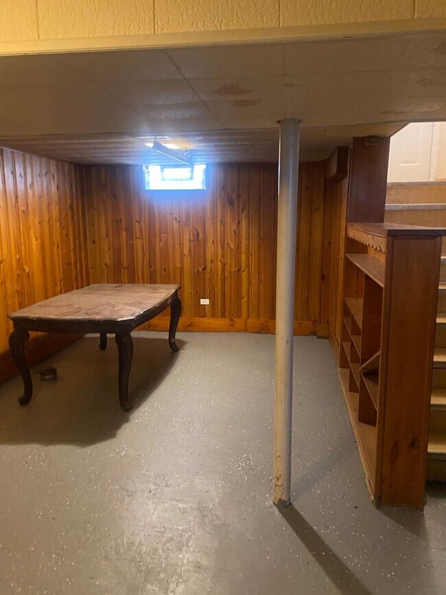 Building Photo - Three bedroom 1 bath bungalow with finished basement and 2 car garage