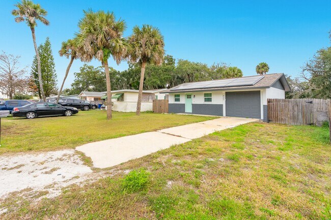 Building Photo - Say Goodbye to Electric Bills & Hurricane Outages with a Solar-Powered Home