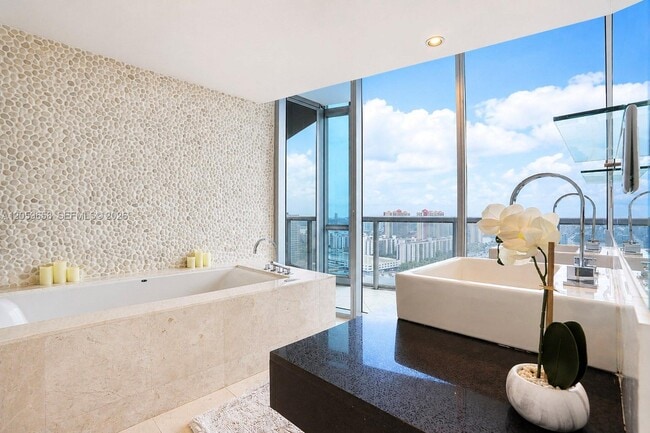 Building Photo - 17121 Collins Ave