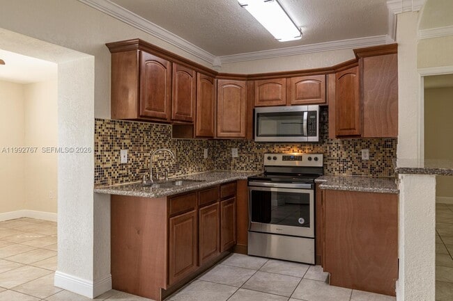 Building Photo - 9750 Jamaica Dr