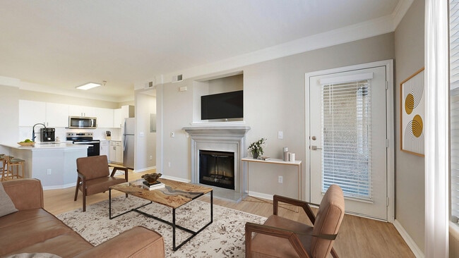 Newly Renovated Living Room with Fireplace - Bristol Village Apartments