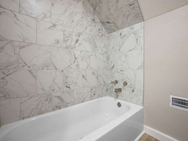 Building Photo - FIRST MONTHS RENT IS FREE! Beautiful remodeled home in Bolivar located near the square! 3 bedroom...