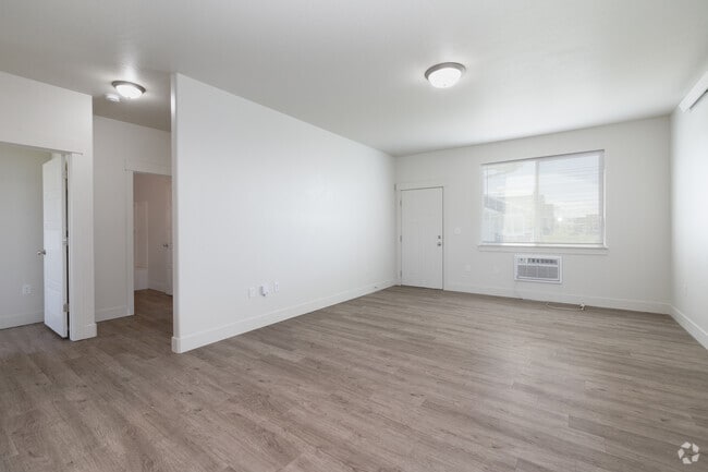 2BR, 2BA - 961SF - Living Room - Idaho Falls Hitt Road, LLC