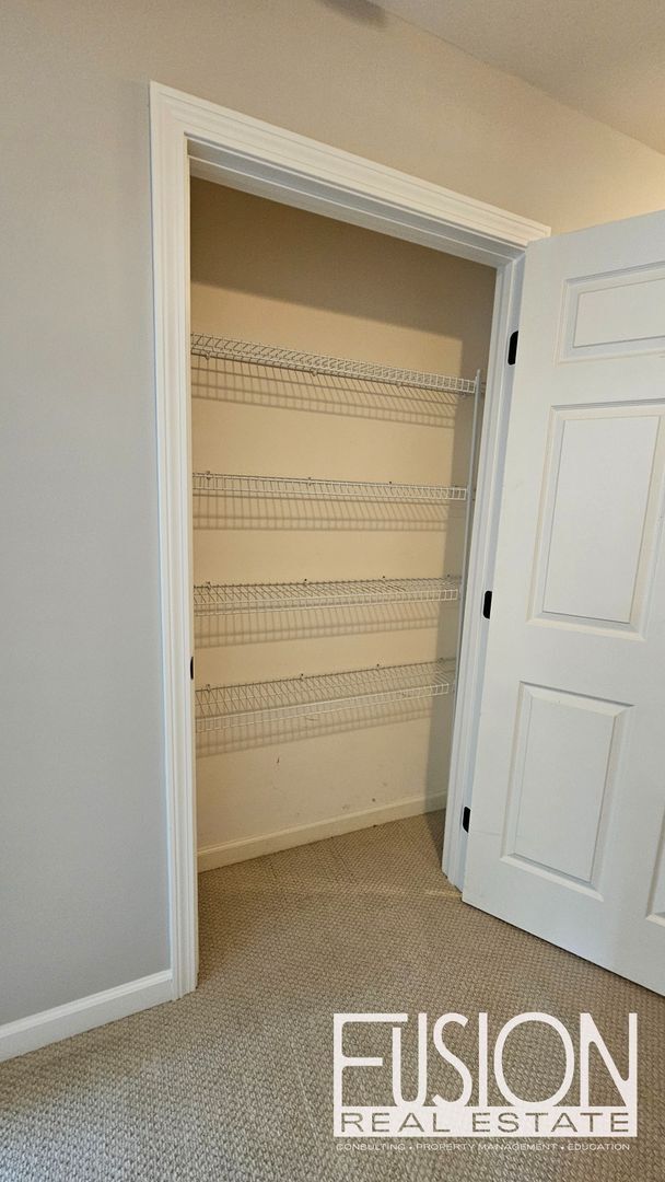 Building Photo - Bright, Modern 3 Bedroom Townhouse in Esse...