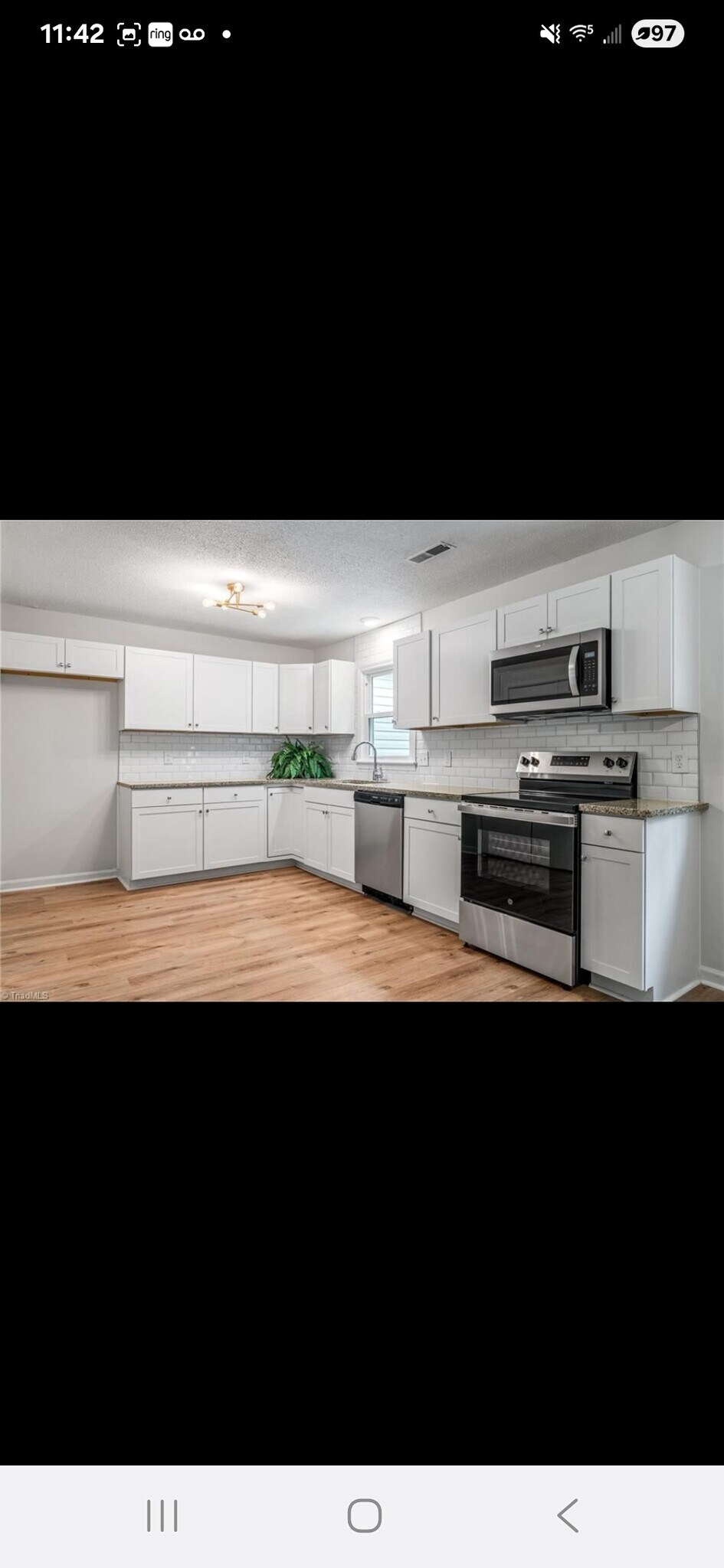 Kitchen/white cabinets - 1819 Bothwell St