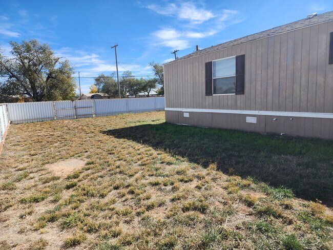 Building Photo - 1210 N Avenue K