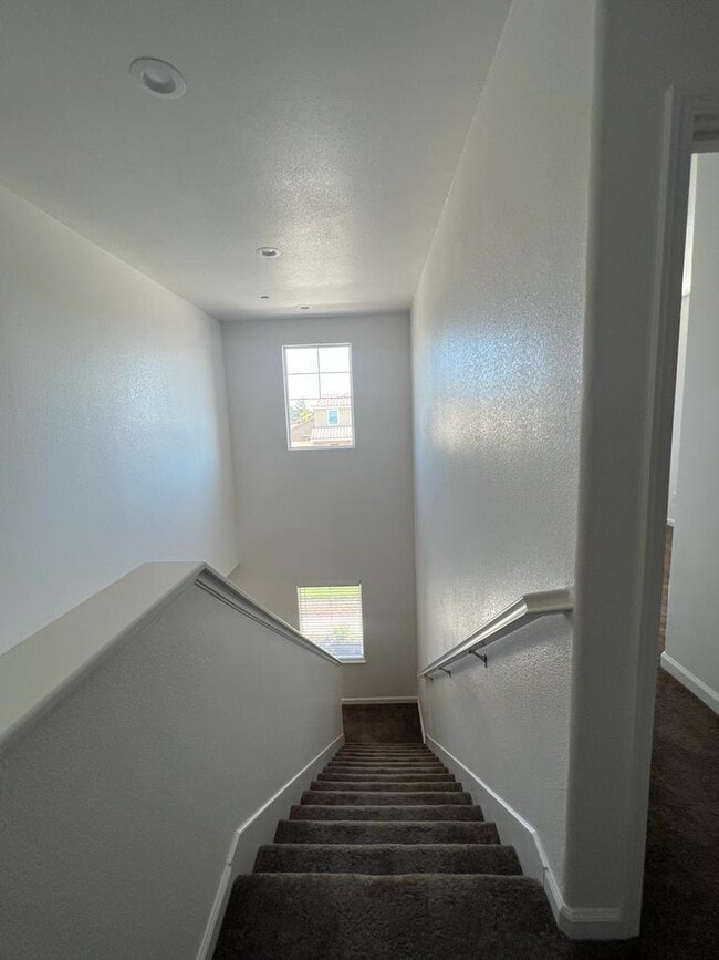 Building Photo - Welcome to modern living in a secure, gated community!