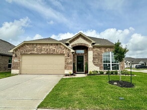 Building Photo - Charming 4-Bedroom Retreat with Granite Accents & Hardwood Elegance in Alvin!