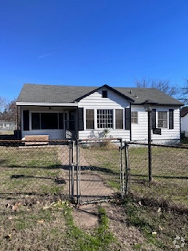 Building Photo - Updated Four Bedroom/Two Bath/Large Yard