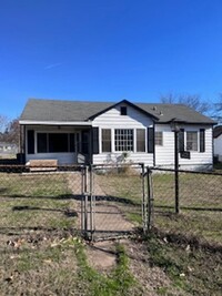 Building Photo - Updated Four Bedroom/Two Bath/Large Yard