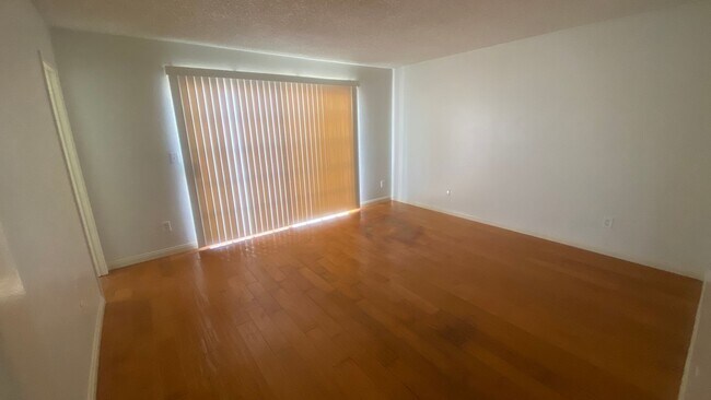 Building Photo - Renovated Townhome, Attached Garage, in Gated HOA Community *READ*