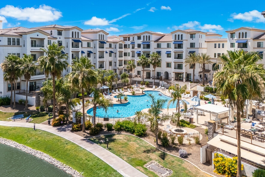 Resort-style pool, spa, and waterfront lounge areas. - 2511 W Queen Creek Rd