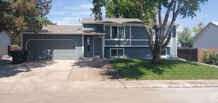 Building Photo - 1823 E 97th Ave
