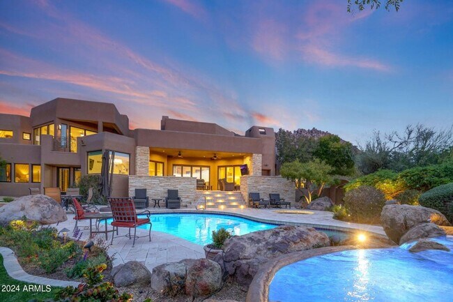 Building Photo - Beautiful custom home with backyard Oasis!