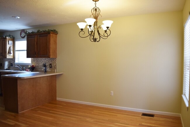 Building Photo - Located in the popular Woodland Hills Subd...