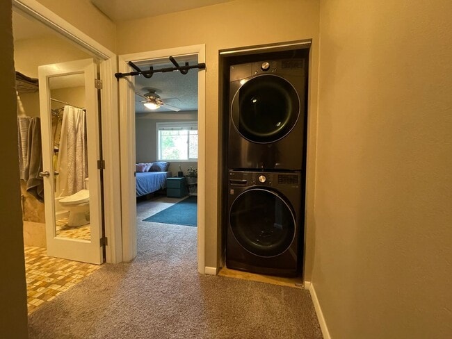 Building Photo - Stylish Corner Condo In Prime Location w/ Parking, Private Outdoor Space & W/D