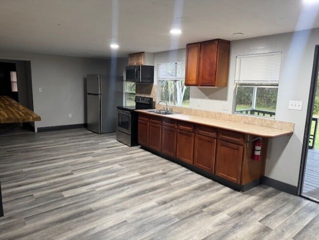 Building Photo - Newly renovated 4/2 Mobile home on large lot in Orlando**