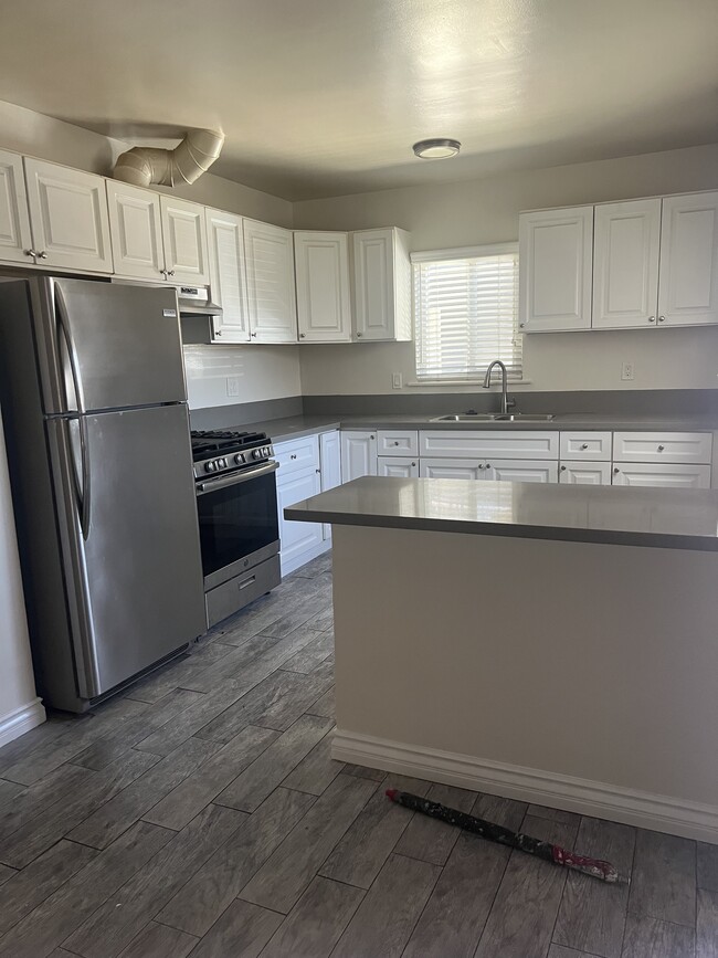 Building Photo - 1210 W 144th St