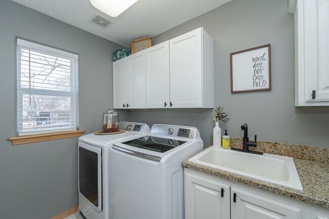 Building Photo - Spacious Home With Finished Basement And 3 Car Garage