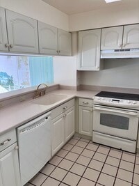 Building Photo - Available Now | One Bedroom, One Bathroom Condo with 1 Assigned Parking Stall