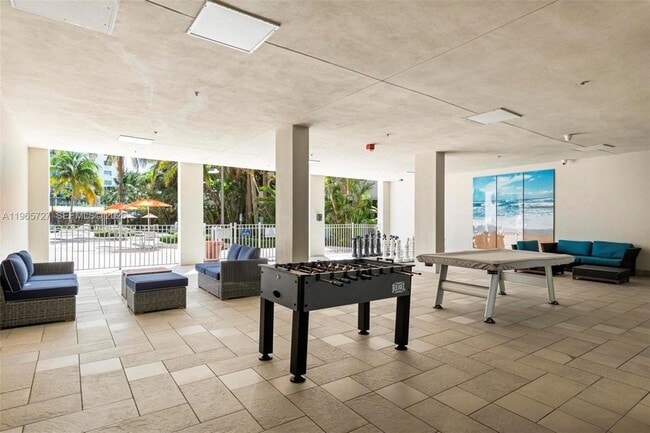 Building Photo - 19380 Collins Ave
