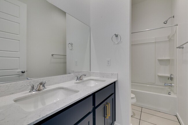 Building Photo - Stunning 4-Level Townhome in Inspirada | R...