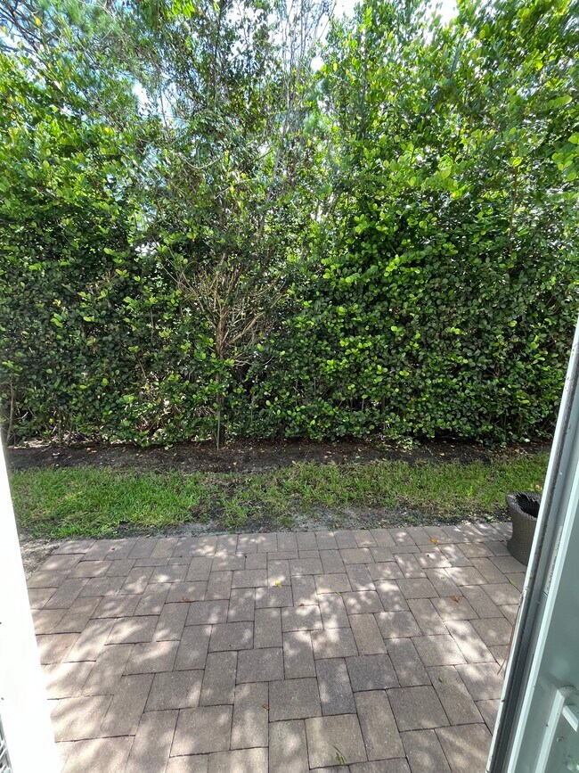 Water Feature Just Beyond The Hedge - 6296 SE Portofino Cir