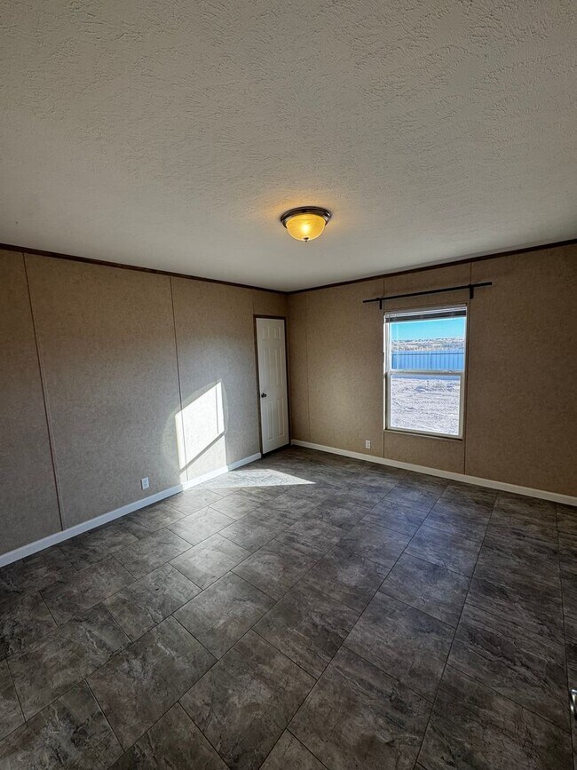 Building Photo - Spacious Four Bedroom Home - Pet Friendly and Horses Allowed!