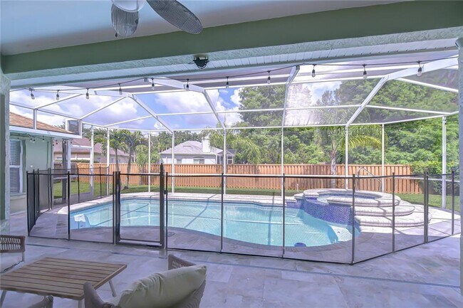 Building Photo - 9813 Woodbay Dr