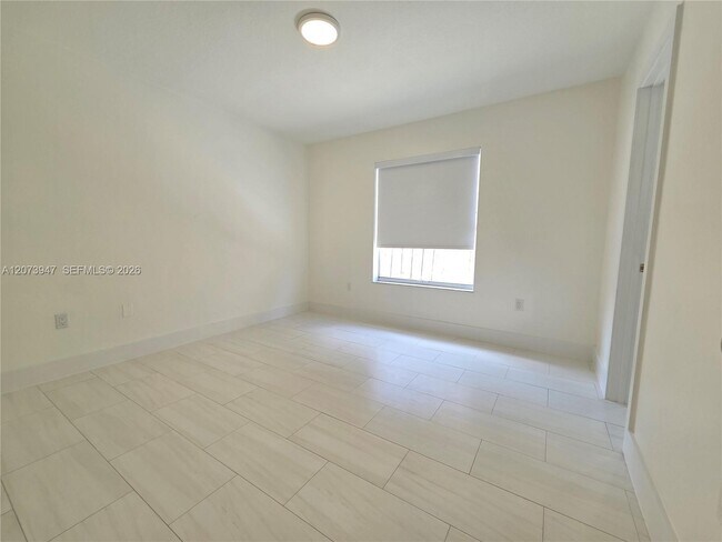 Building Photo - 242 NW 51st Ave